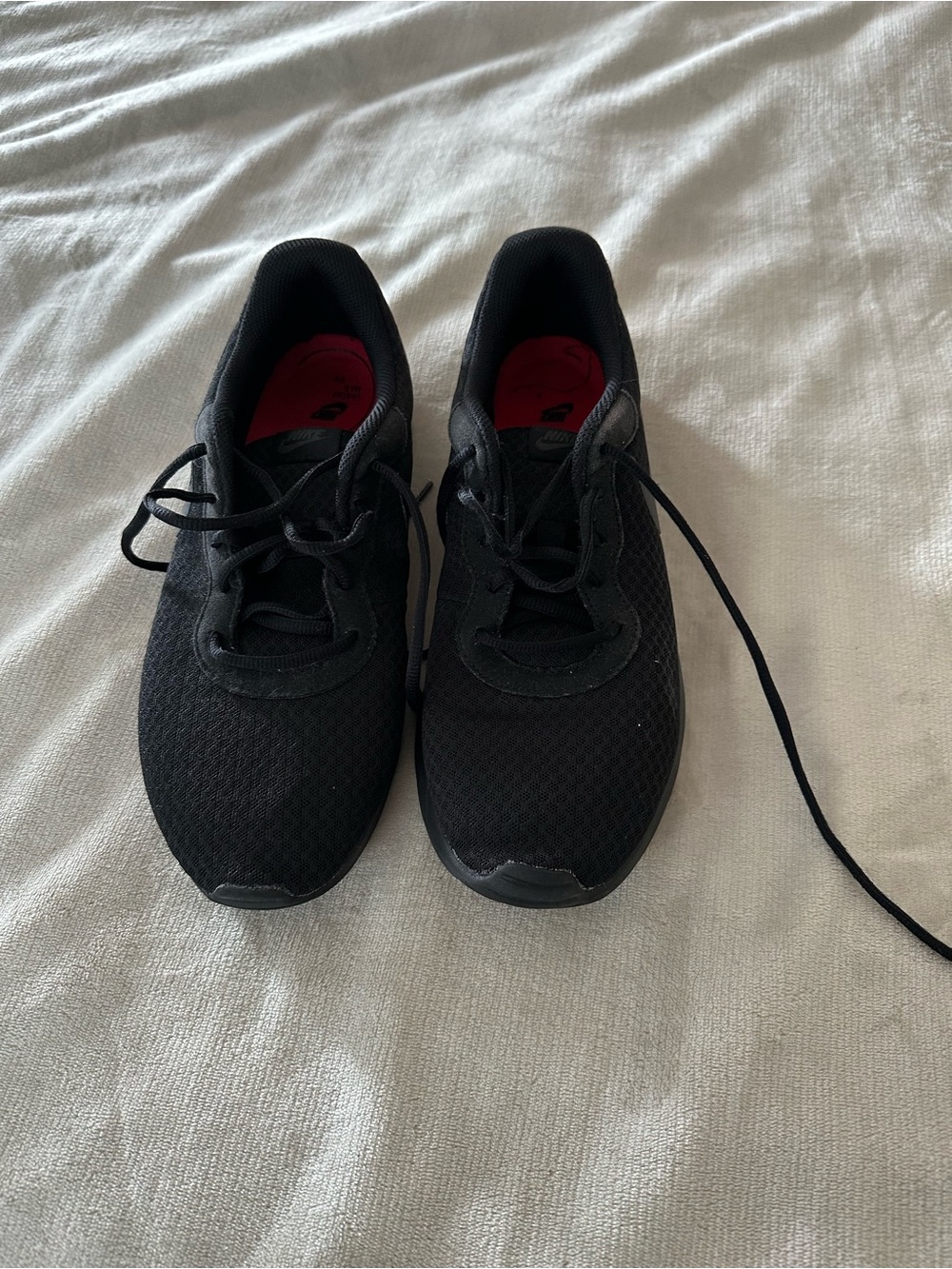 Nike Men's Black Sneakers with Red Insole Accents